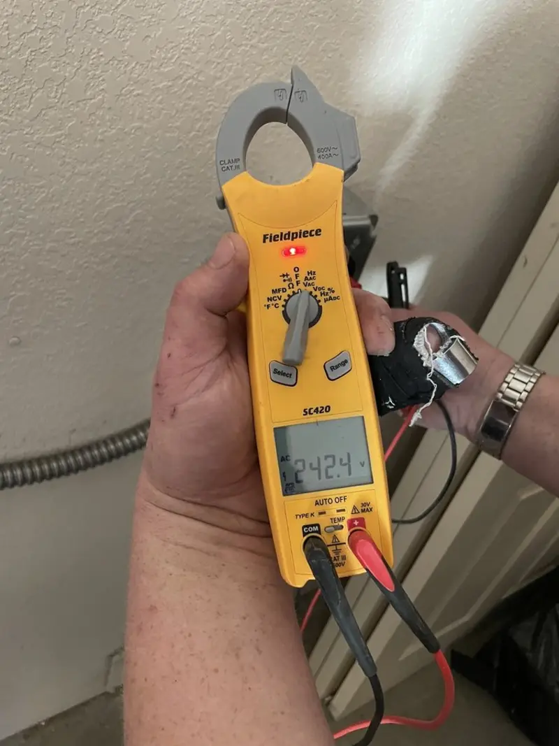 Voltage testing with clamp meter during Hot Tub / Pool Electrical Wiring in Lyon